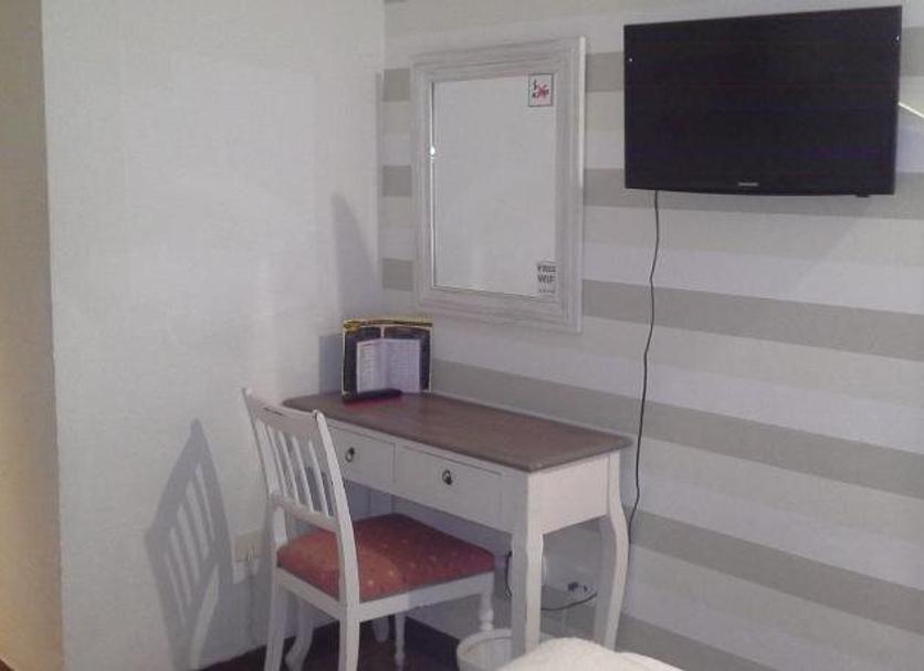 Comodidade do quarto Foto