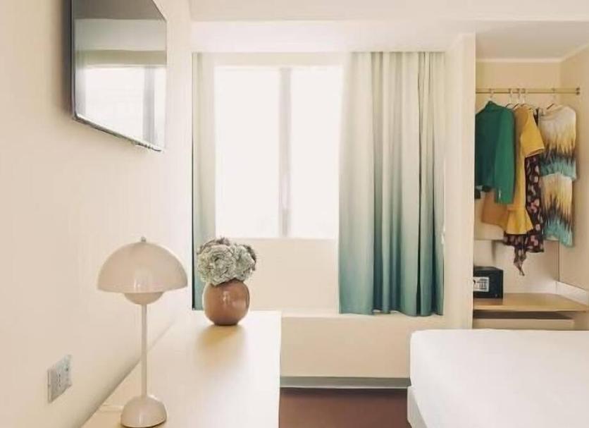 Comodidade do quarto Foto