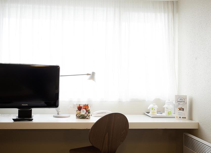 Comodidade do quarto Foto