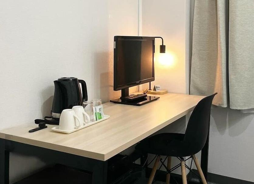 Comodidade do quarto Foto