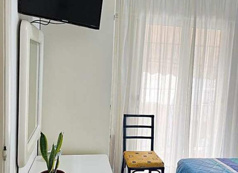 Comodidade do quarto Foto